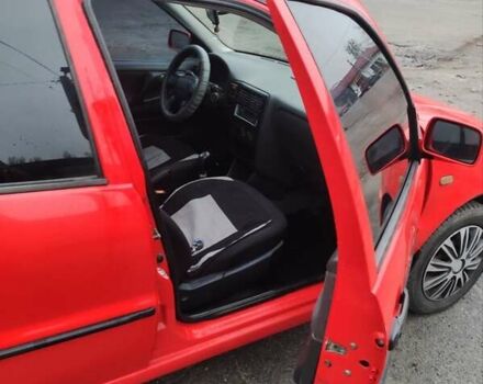 Красный Фольксваген Поло, объемом двигателя 1 л и пробегом 286 тыс. км за 1900 $, фото 5 на Automoto.ua