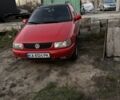 Червоний Фольксваген Поло, об'ємом двигуна 1.4 л та пробігом 266 тис. км за 1500 $, фото 1 на Automoto.ua