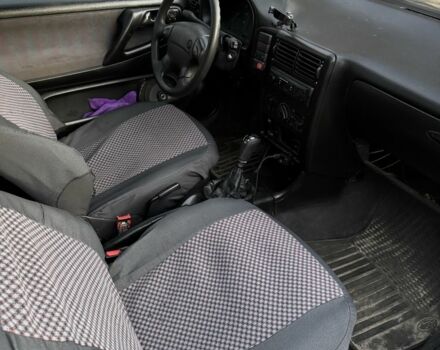 Червоний Фольксваген Поло, об'ємом двигуна 1.4 л та пробігом 266 тис. км за 1500 $, фото 5 на Automoto.ua