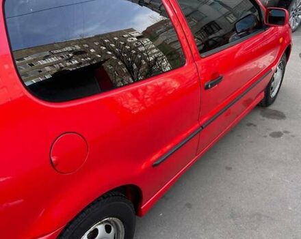 Красный Фольксваген Поло, объемом двигателя 1 л и пробегом 210 тыс. км за 2100 $, фото 3 на Automoto.ua