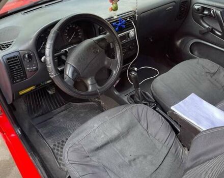 Красный Фольксваген Поло, объемом двигателя 1 л и пробегом 210 тыс. км за 2100 $, фото 4 на Automoto.ua