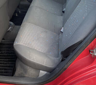 Красный Фольксваген Поло, объемом двигателя 1.4 л и пробегом 232 тыс. км за 3650 $, фото 11 на Automoto.ua