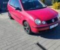 Красный Фольксваген Поло, объемом двигателя 1.4 л и пробегом 300 тыс. км за 4000 $, фото 1 на Automoto.ua