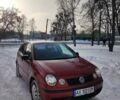 Червоний Фольксваген Поло, об'ємом двигуна 1.39 л та пробігом 200 тис. км за 3499 $, фото 1 на Automoto.ua