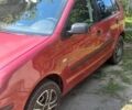 Красный Фольксваген Поло, объемом двигателя 1.4 л и пробегом 220 тыс. км за 3800 $, фото 2 на Automoto.ua