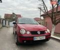 Красный Фольксваген Поло, объемом двигателя 1.2 л и пробегом 210 тыс. км за 2900 $, фото 1 на Automoto.ua