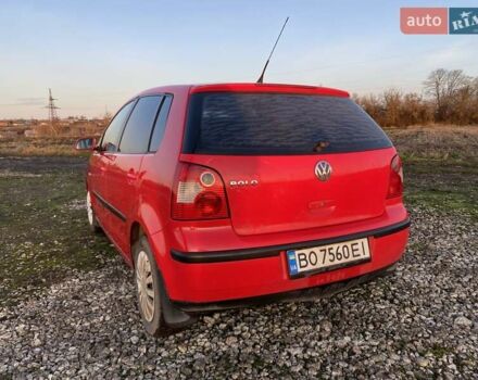 Красный Фольксваген Поло, объемом двигателя 1.2 л и пробегом 202 тыс. км за 2800 $, фото 1 на Automoto.ua