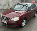 Красный Фольксваген Поло, объемом двигателя 1.4 л и пробегом 221 тыс. км за 4200 $, фото 1 на Automoto.ua