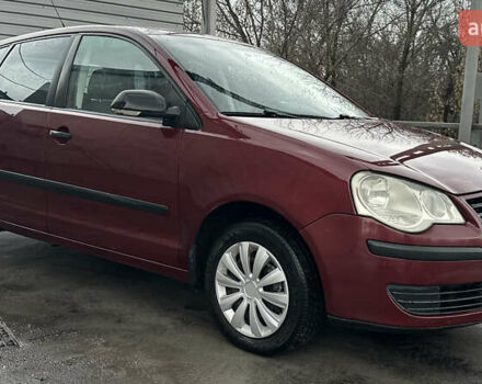 Красный Фольксваген Поло, объемом двигателя 1.4 л и пробегом 221 тыс. км за 4200 $, фото 5 на Automoto.ua