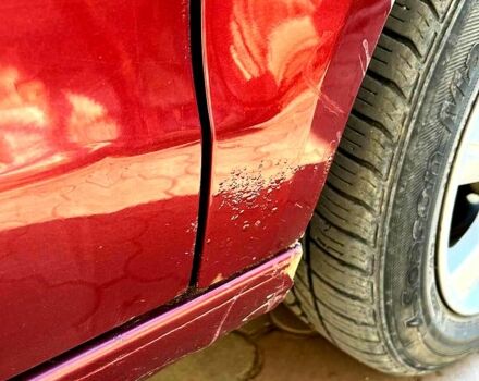 Червоний Фольксваген Поло, об'ємом двигуна 1.4 л та пробігом 0 тис. км за 5950 $, фото 11 на Automoto.ua