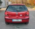 Красный Фольксваген Поло, объемом двигателя 1.4 л и пробегом 240 тыс. км за 4950 $, фото 2 на Automoto.ua