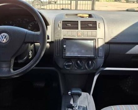 Червоний Фольксваген Поло, об'ємом двигуна 1.4 л та пробігом 202 тис. км за 5699 $, фото 4 на Automoto.ua