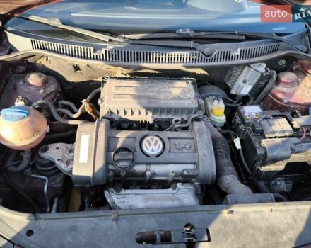 Червоний Фольксваген Поло, об'ємом двигуна 1.39 л та пробігом 339 тис. км за 3850 $, фото 13 на Automoto.ua