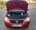 Красный Фольксваген Поло, объемом двигателя 1.4 л и пробегом 240 тыс. км за 4950 $, фото 22 на Automoto.ua