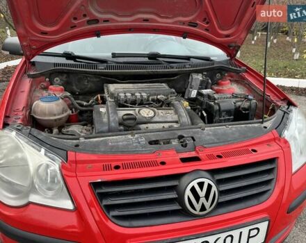 Красный Фольксваген Поло, объемом двигателя 1.4 л и пробегом 202 тыс. км за 4900 $, фото 8 на Automoto.ua