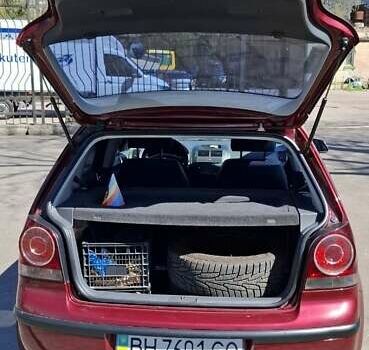 Червоний Фольксваген Поло, об'ємом двигуна 1.4 л та пробігом 202 тис. км за 5699 $, фото 3 на Automoto.ua