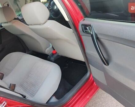Красный Фольксваген Поло, объемом двигателя 1.4 л и пробегом 240 тыс. км за 4950 $, фото 9 на Automoto.ua