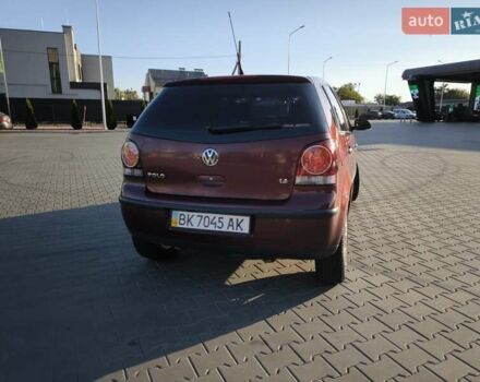 Червоний Фольксваген Поло, об'ємом двигуна 1.39 л та пробігом 339 тис. км за 3850 $, фото 2 на Automoto.ua