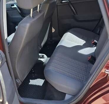 Червоний Фольксваген Поло, об'ємом двигуна 1.4 л та пробігом 202 тис. км за 5699 $, фото 6 на Automoto.ua