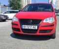Червоний Фольксваген Поло, об'ємом двигуна 1.39 л та пробігом 189 тис. км за 5800 $, фото 1 на Automoto.ua