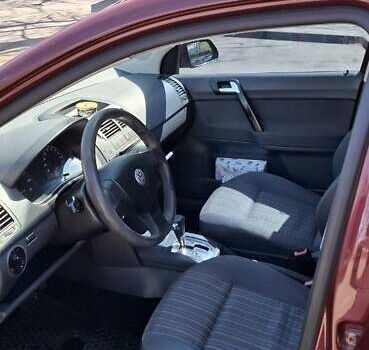 Червоний Фольксваген Поло, об'ємом двигуна 1.4 л та пробігом 202 тис. км за 5699 $, фото 5 на Automoto.ua