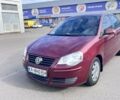 Красный Фольксваген Поло, объемом двигателя 1.4 л и пробегом 198 тыс. км за 4750 $, фото 1 на Automoto.ua