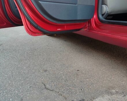 Красный Фольксваген Поло, объемом двигателя 1.4 л и пробегом 240 тыс. км за 4950 $, фото 15 на Automoto.ua