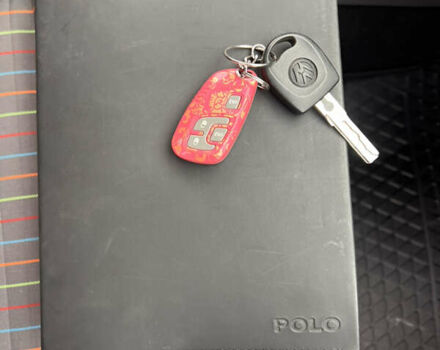 Червоний Фольксваген Поло, об'ємом двигуна 1.4 л та пробігом 180 тис. км за 6000 $, фото 22 на Automoto.ua