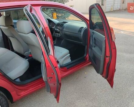 Красный Фольксваген Поло, объемом двигателя 1.4 л и пробегом 240 тыс. км за 4950 $, фото 19 на Automoto.ua