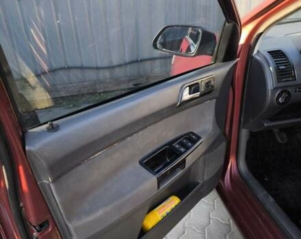 Червоний Фольксваген Поло, об'ємом двигуна 1.39 л та пробігом 339 тис. км за 3850 $, фото 12 на Automoto.ua