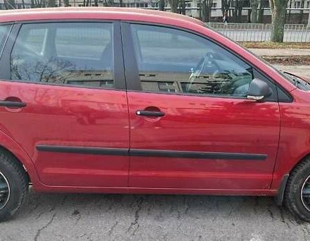 Красный Фольксваген Поло, объемом двигателя 1.4 л и пробегом 99 тыс. км за 6599 $, фото 2 на Automoto.ua