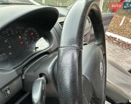 Красный Фольксваген Поло, объемом двигателя 1.4 л и пробегом 202 тыс. км за 4900 $, фото 5 на Automoto.ua