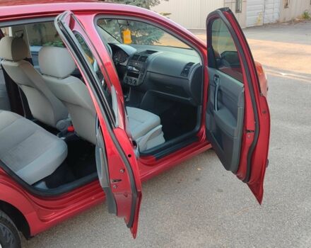 Красный Фольксваген Поло, объемом двигателя 1.4 л и пробегом 240 тыс. км за 4950 $, фото 17 на Automoto.ua