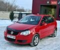 Красный Фольксваген Поло, объемом двигателя 1.4 л и пробегом 135 тыс. км за 5900 $, фото 1 на Automoto.ua