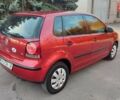 Красный Фольксваген Поло, объемом двигателя 1.4 л и пробегом 240 тыс. км за 4950 $, фото 1 на Automoto.ua