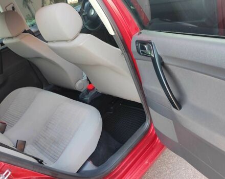 Красный Фольксваген Поло, объемом двигателя 1.4 л и пробегом 240 тыс. км за 4950 $, фото 7 на Automoto.ua