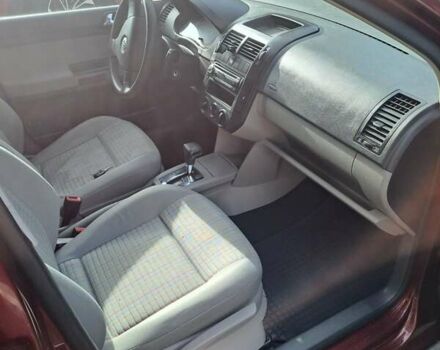 Червоний Фольксваген Поло, об'ємом двигуна 1.39 л та пробігом 189 тис. км за 5500 $, фото 18 на Automoto.ua