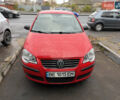 Червоний Фольксваген Поло, об'ємом двигуна 1.4 л та пробігом 130 тис. км за 5700 $, фото 1 на Automoto.ua