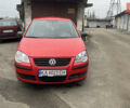 Красный Фольксваген Поло, объемом двигателя 1.4 л и пробегом 200 тыс. км за 4500 $, фото 1 на Automoto.ua
