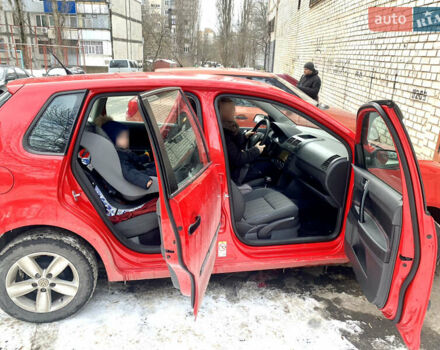 Червоний Фольксваген Поло, об'ємом двигуна 1.4 л та пробігом 130 тис. км за 5700 $, фото 7 на Automoto.ua