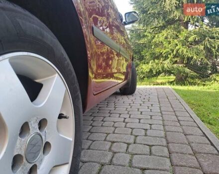 Червоний Фольксваген Поло, об'ємом двигуна 1.39 л та пробігом 189 тис. км за 5500 $, фото 9 на Automoto.ua