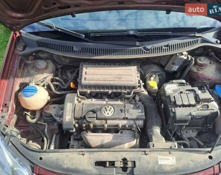 Червоний Фольксваген Поло, об'ємом двигуна 1.39 л та пробігом 189 тис. км за 5500 $, фото 13 на Automoto.ua