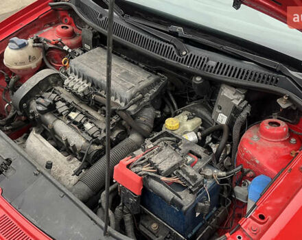 Красный Фольксваген Поло, объемом двигателя 1.4 л и пробегом 200 тыс. км за 4500 $, фото 23 на Automoto.ua