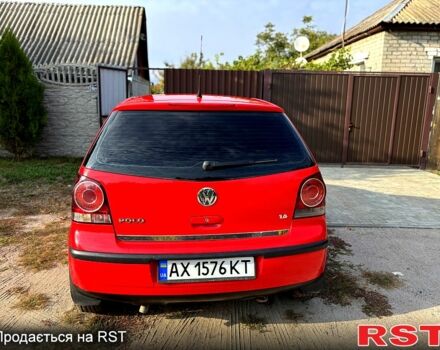 Красный Фольксваген Поло, объемом двигателя 1.4 л и пробегом 168 тыс. км за 6000 $, фото 2 на Automoto.ua
