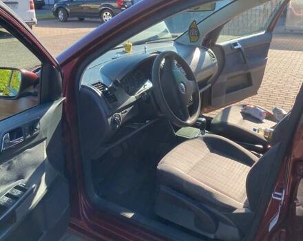 Красный Фольксваген Поло, объемом двигателя 1.4 л и пробегом 215 тыс. км за 4500 $, фото 6 на Automoto.ua