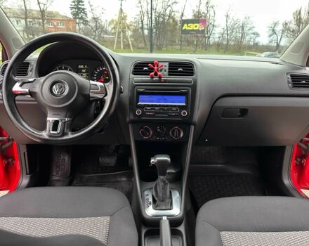 Красный Фольксваген Поло, объемом двигателя 1.4 л и пробегом 158 тыс. км за 6950 $, фото 6 на Automoto.ua