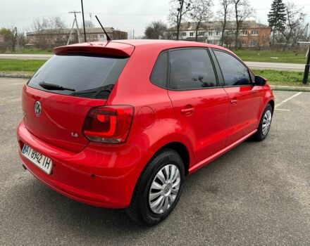 Красный Фольксваген Поло, объемом двигателя 1.4 л и пробегом 158 тыс. км за 6950 $, фото 3 на Automoto.ua