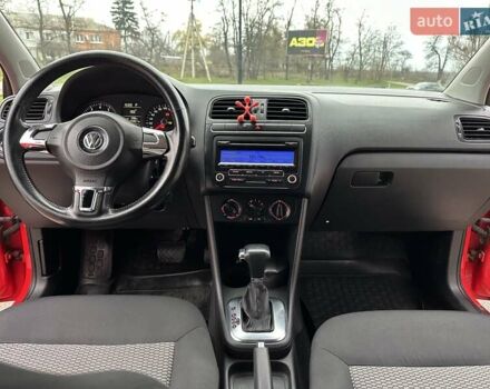 Красный Фольксваген Поло, объемом двигателя 1.39 л и пробегом 158 тыс. км за 6950 $, фото 10 на Automoto.ua