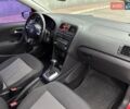 Красный Фольксваген Поло, объемом двигателя 1.39 л и пробегом 158 тыс. км за 6950 $, фото 16 на Automoto.ua