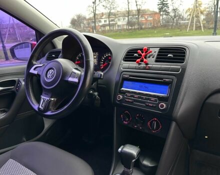 Красный Фольксваген Поло, объемом двигателя 1.4 л и пробегом 158 тыс. км за 6950 $, фото 10 на Automoto.ua